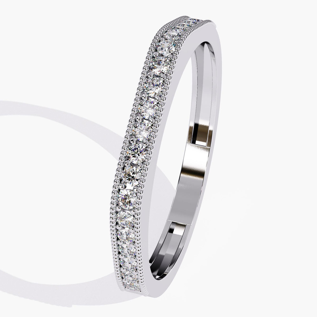Angled view of a 14k white gold flat-top band featuring a row of lab-grown round diamonds bordered by milgrain edges. Ideal for pairing with other rings or wearing solo as a structured wedding band.