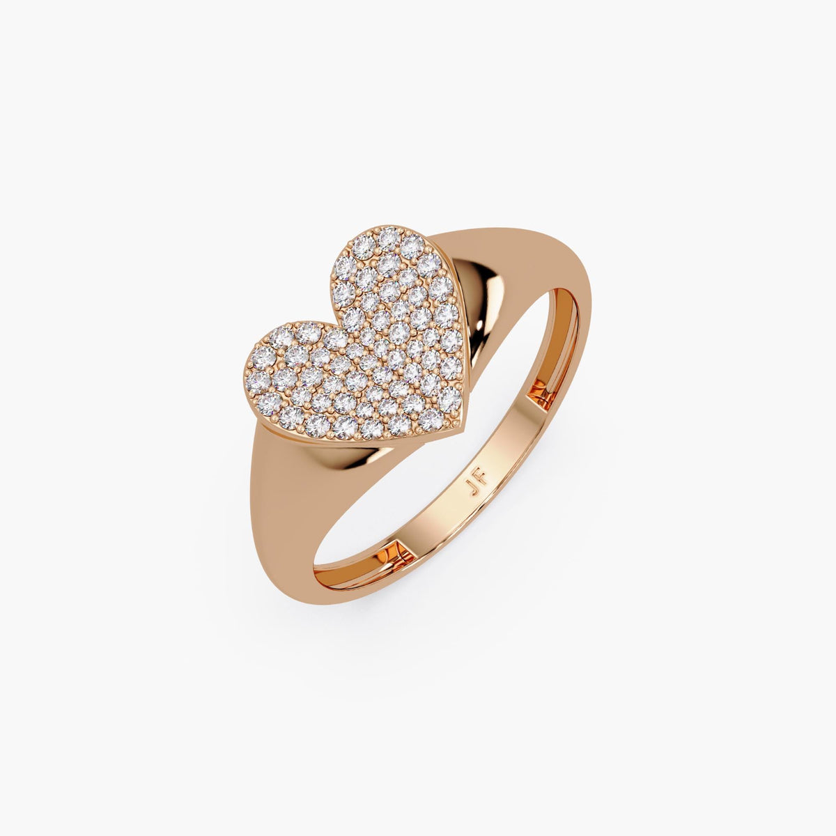 14K rose gold heart ring with pavé-set natural diamonds on a sculpted flat heart. The inner band is engraved with “JF.”