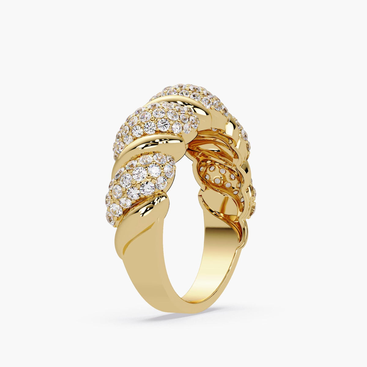 14k yellow gold croissant ring with lab-grown pavé diamonds, shown at an angled view to highlight the wide spiral dome design, smooth inner band, and alternating ridges of polished gold and clustered diamonds. A bold statement cocktail ring made for everyday luxury or gifting.