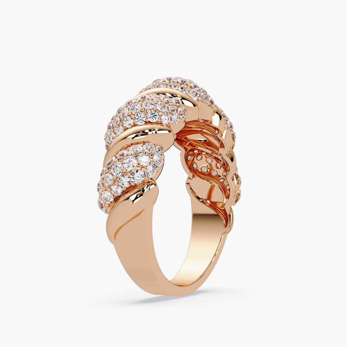 A twisted rope dome ring in 14k rose gold with pavé-set lab diamonds, shown at an angle to highlight the chunky braided design, open gallery, and polished inner band. A bold statement ring and fine fashion piece, perfect as a birthday gift or anniversary gift for her.