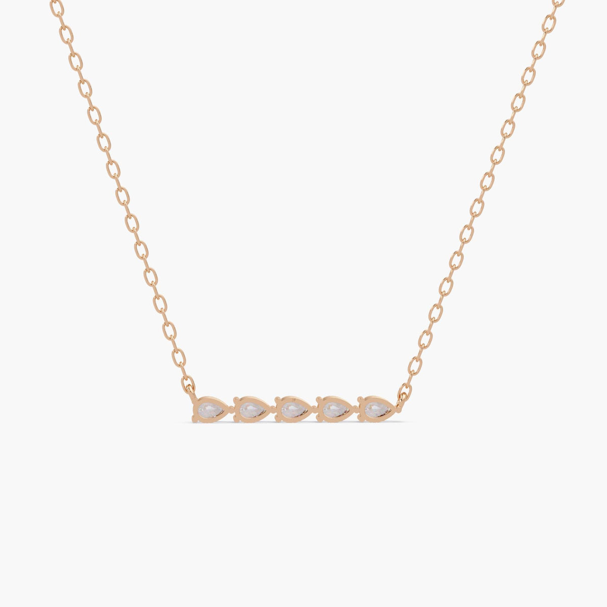 Back view of a horizontal bar necklace in 14k rose gold, showing five pear-shaped prong-set diamond backs arranged in a neat row, attached to a delicate chain on each side.