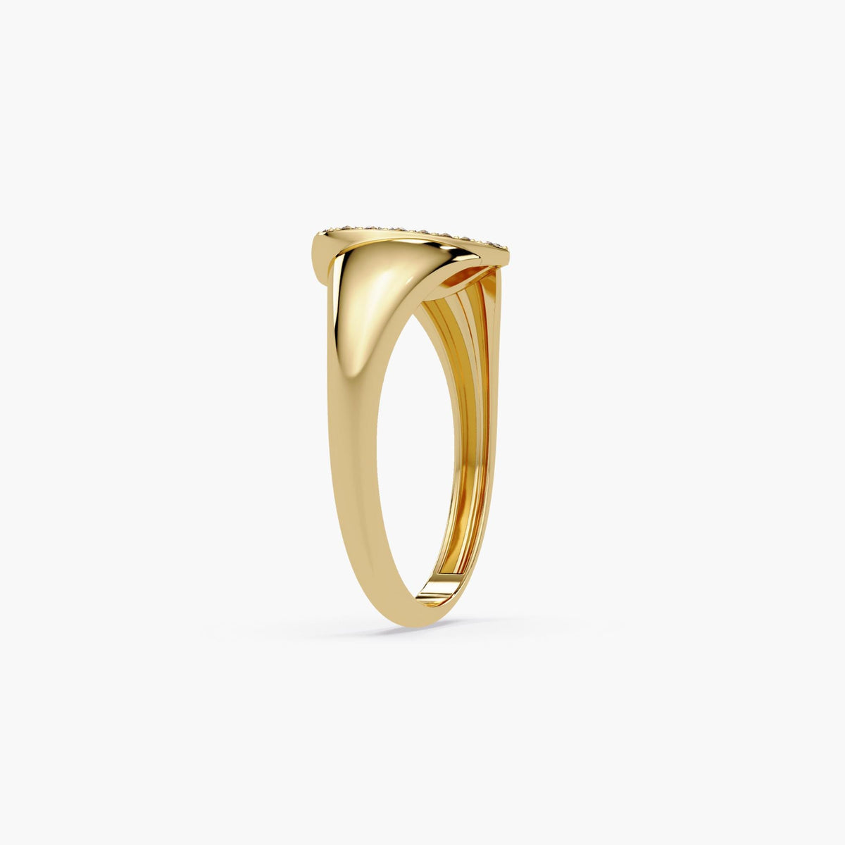 14K yellow gold ring showing the smooth, sculpted underside of a flat heart centerpiece. The tapered band curves cleanly into the base of the heart.