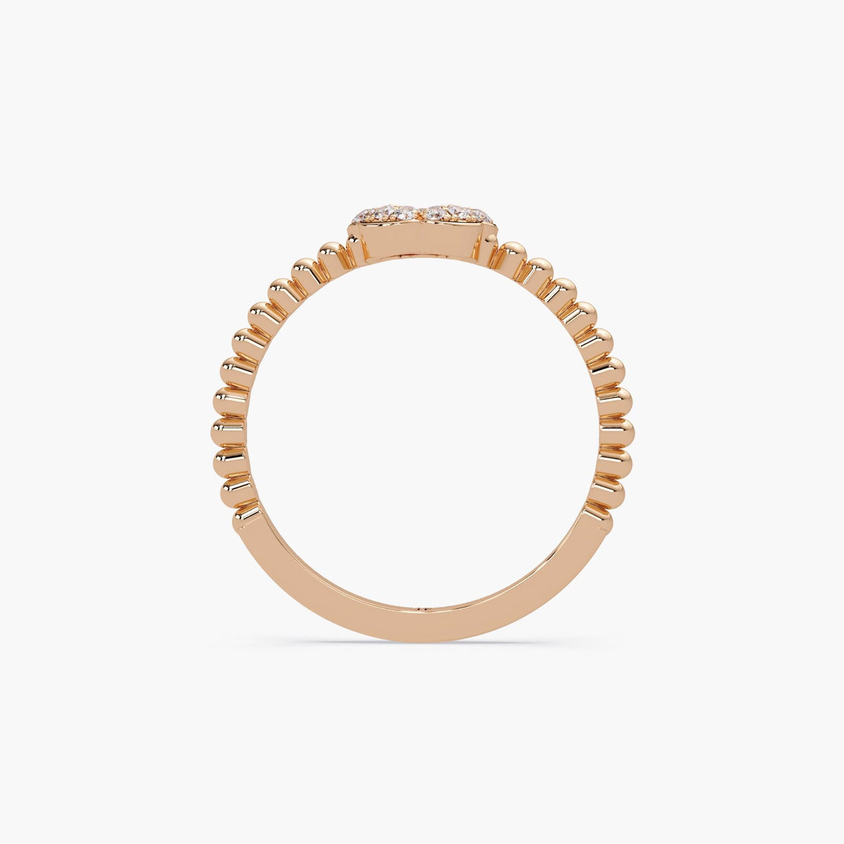 14k rose gold ring showing the full circular shape with a beaded upper band and a smooth lower shank. The top floral setting is slightly raised, with a flat base supporting the five-petal pavé diamond cluster.