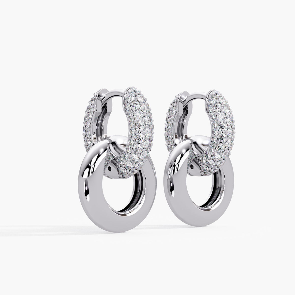 14K white gold earrings with double hoop silhouette—sparkling pavé diamond huggies and white gold mirror-polished circular drops. These convertible earrings move effortlessly from day to evening, offering a clean, contemporary statement earrings for the modern woman.