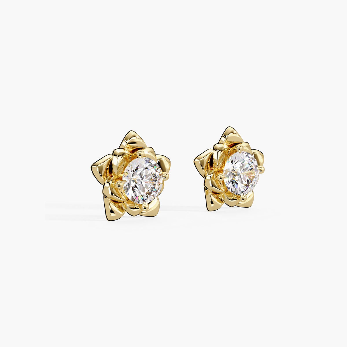 Floral diamond stud earrings in 14K yellow gold featuring round lab-grown diamonds set in a layered petal design. A gift for birthdays, weddings, or everyday wear. Perfect for weddings and summer style