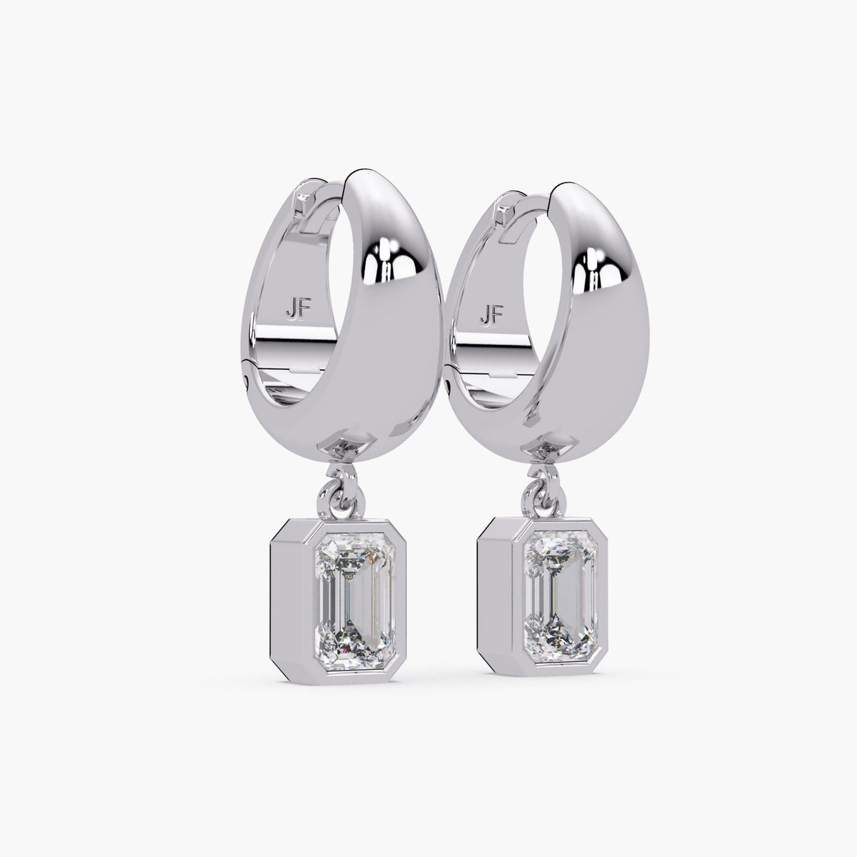 dainty 15mm white gold huggie hoop earrings with leverback closure, featuring bezel-set emerald cut lab-grown diamond charms. The modern teardrop design combines minimalist style with subtle sparkle, ideal for everyday wear or elevated occasions.