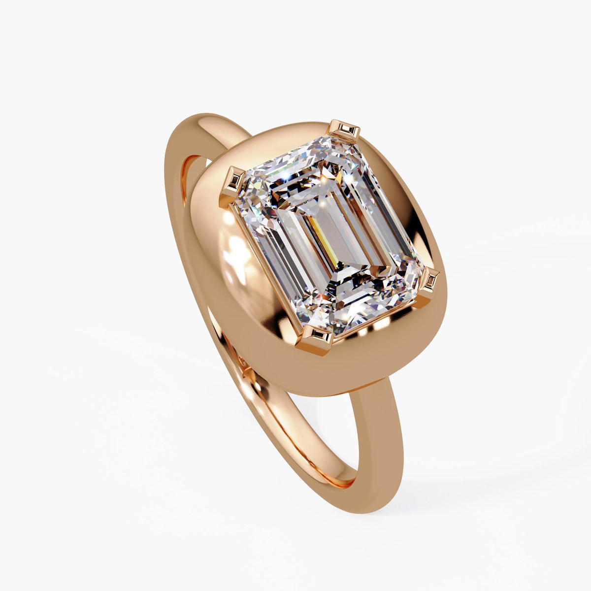 East-west emerald cut diamond bezel ring in 14K rose gold with 1.60 carat IGI-certified lab diamond and a 2mm shank, bold dome design for modern engagement or statement wear. A meaningful gift for birthdays, anniversaries, or celebrating personal milestones.