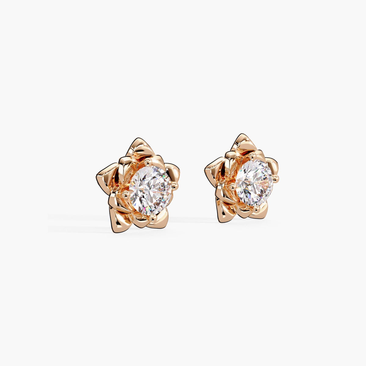 Floral diamond stud earrings in 14K rose gold featuring round lab-grown diamonds set in a layered petal design. A gift for birthdays, weddings, or everyday wear. Perfect for weddings and summer style