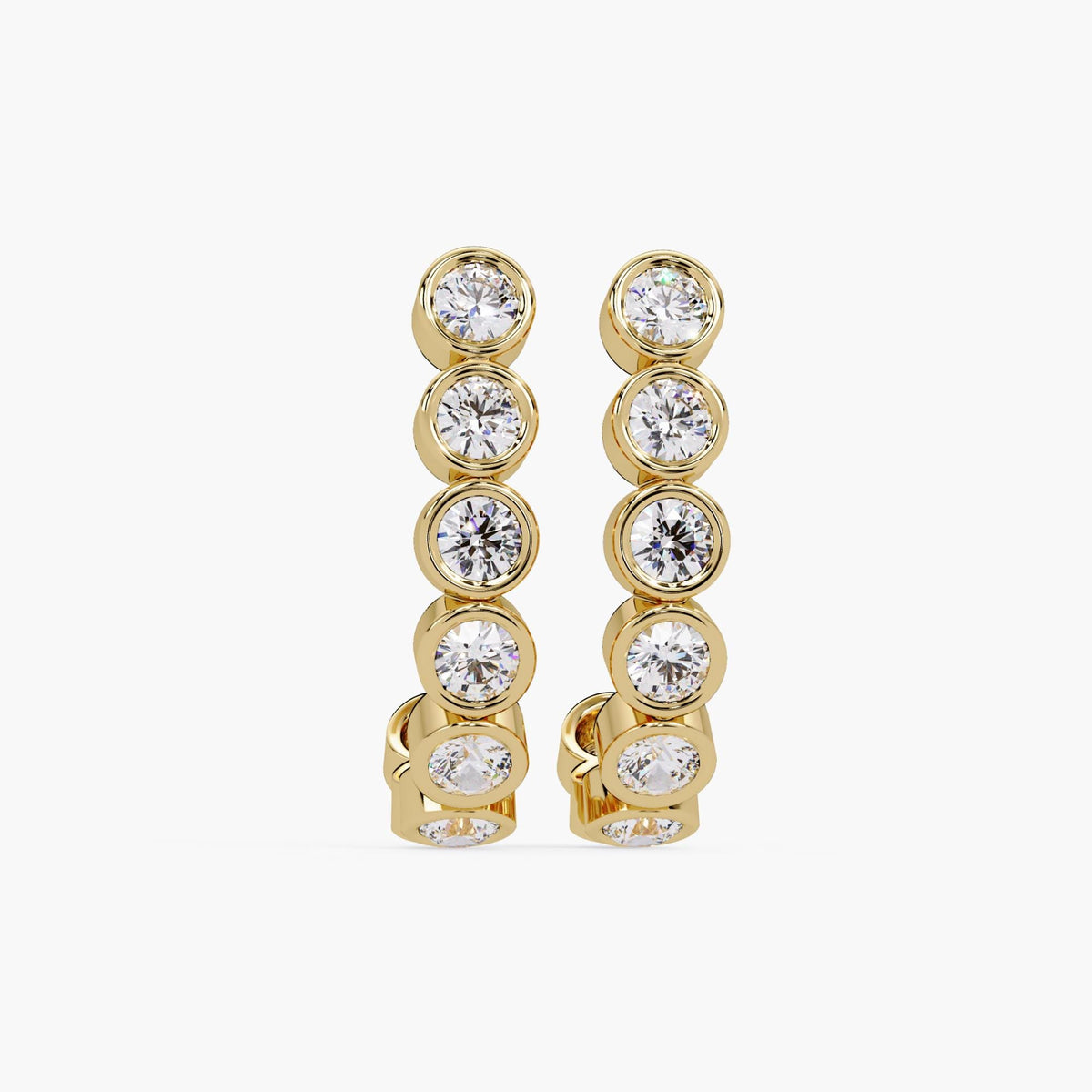 14K yellow gold J-hoop earrings with bezel-set round cut diamonds in each hoop, displayed upright against a white background. The clean, symmetrical view highlights the full row of sparkling diamonds and the polished gold finish