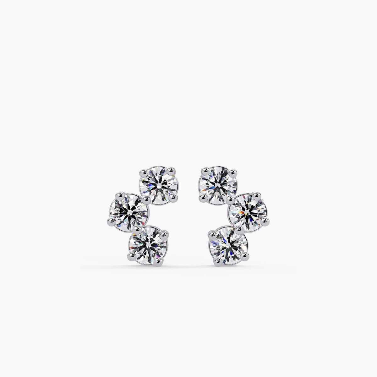 Three-stone cluster stud earrings in 14K white gold with round lab-grown diamonds in a curved V-shape design.