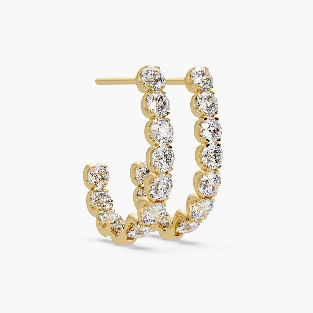 14K gold J-hoop earrings featuring inside and outside diamond placement