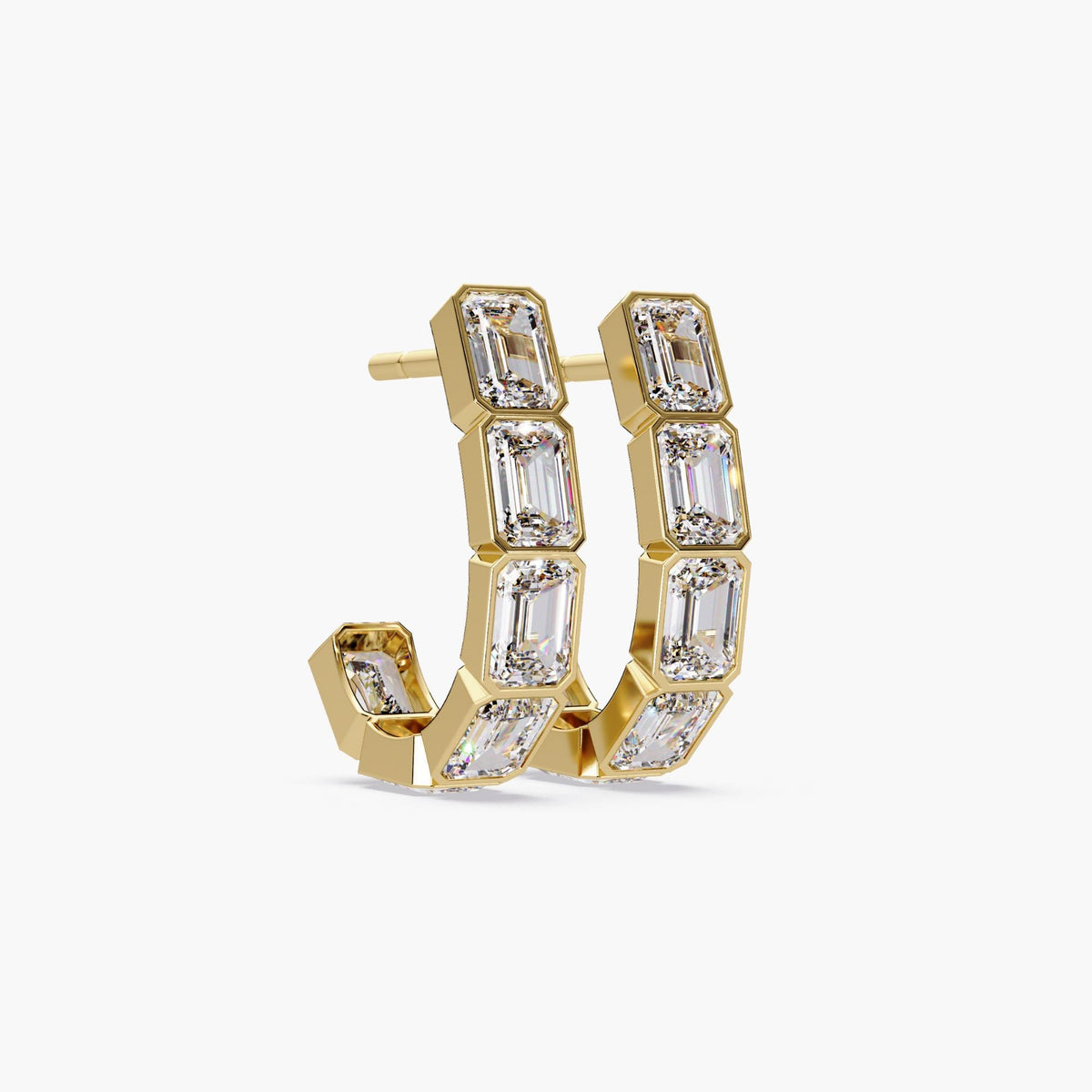 14K yellow gold J-hoop earrings with five bezel-set emerald-cut lab-grown diamonds in each earring. The bold geometric setting and structured curve give these hoops a refined, statement-making silhouette.