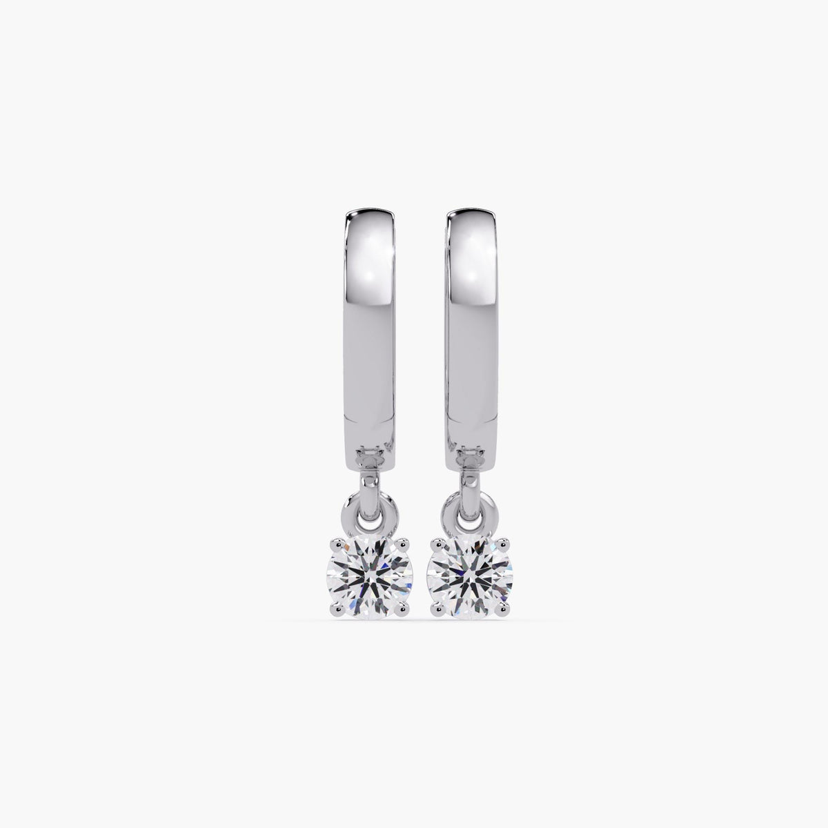 14K white gold huggie hoop earrings with round lab-grown diamond drops in four-prong settings. Hinged latch back closure
