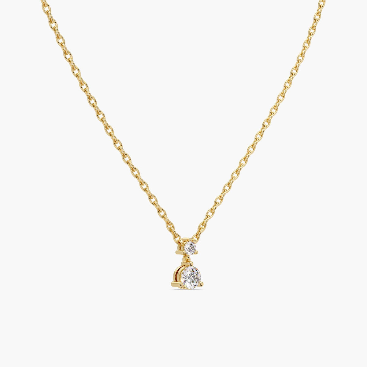 14K yellow gold prong-set diamond pendant necklace with 5mm and 3mm round lab diamonds