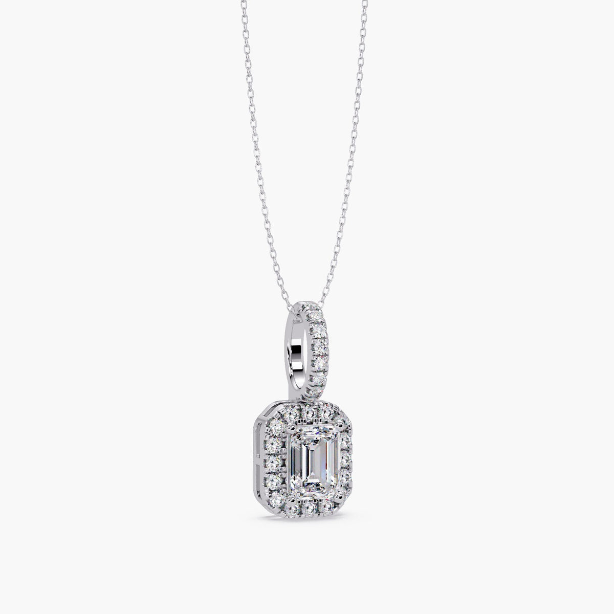 14K white gold emerald cut diamond halo pendant with pavé diamond bail, side angle view on dainty cable chain