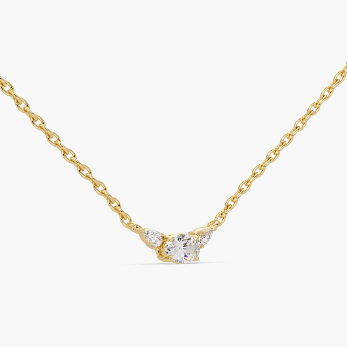 4K yellow gold necklace featuring three lab-grown diamonds, an oval center stone with pear accents in a prong setting, delicate design for minimalist jewelry lovers, bridal accessories, or everyday gold layering.