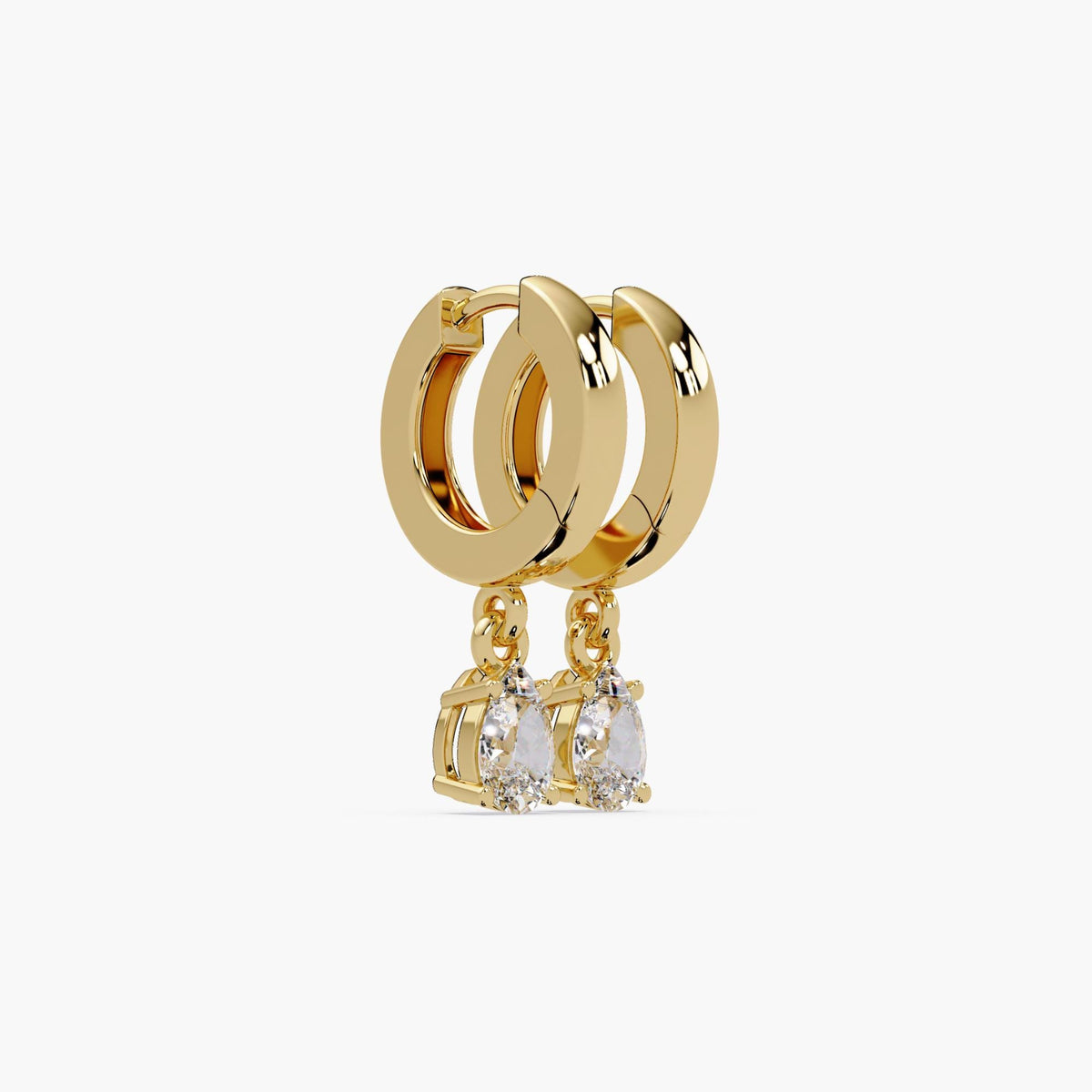 14K yellow gold huggie earrings with dangling pear-shaped lab-grown diamonds. The hinged hoops feature a secure clasp and open-back prong setting