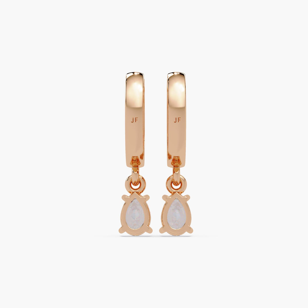 14K rose gold huggie earrings with pear-shaped diamond dangles. The earrings feature a solid gold setting with "JF" hallmark engraving on the hoops and closed-back prong-set pear diamonds.