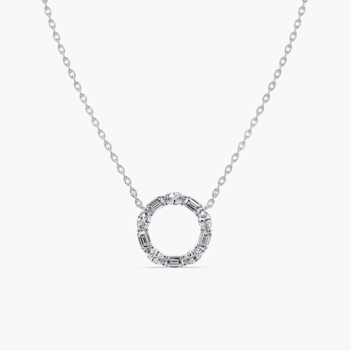 Diamond circle pendant necklace in 14K white gold, featuring alternating lab-grown oval and emerald-cut diamonds in a 20mm open circle design.
