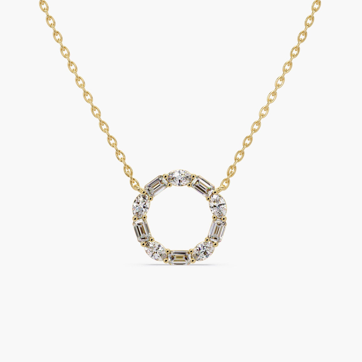 open circle pendant necklace in 14K yellow gold, featuring alternating oval and emerald-cut lab-grown diamonds totaling 2.5 carats.
