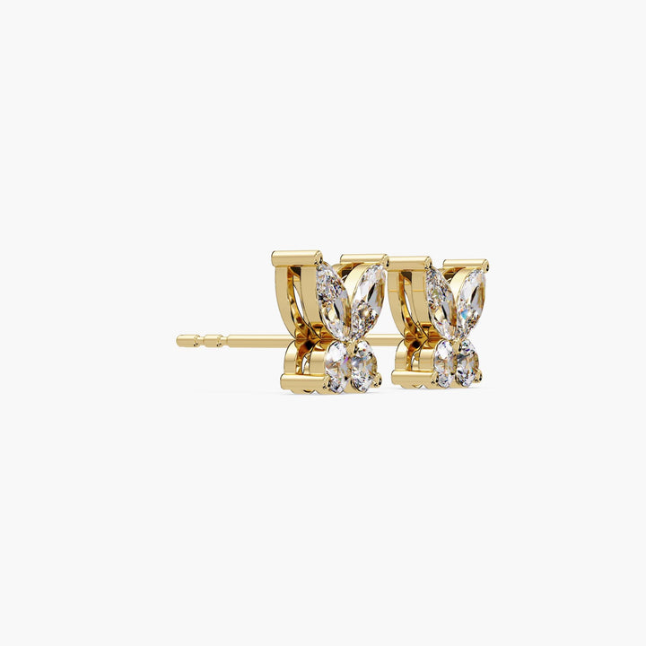 14K yellow gold butterfly diamond earrings with marquise and round lab-grown diamonds, shown in profile to highlight sculptural collet setting and elegant craftsmanship.