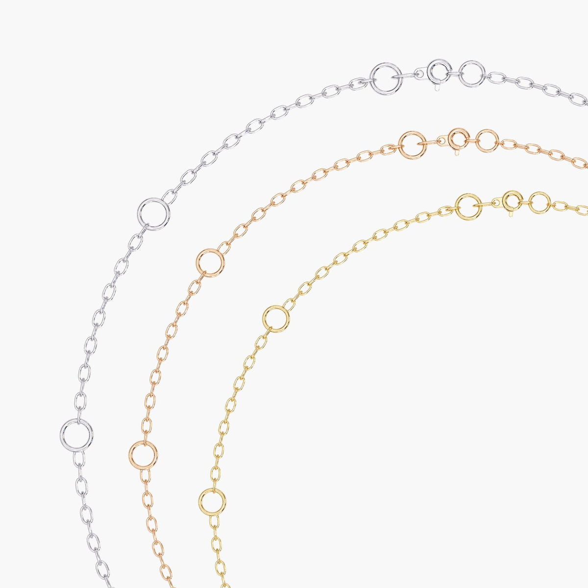 Adjustable cable chain options in 14K rose, white, and yellow gold with spring ring clasp