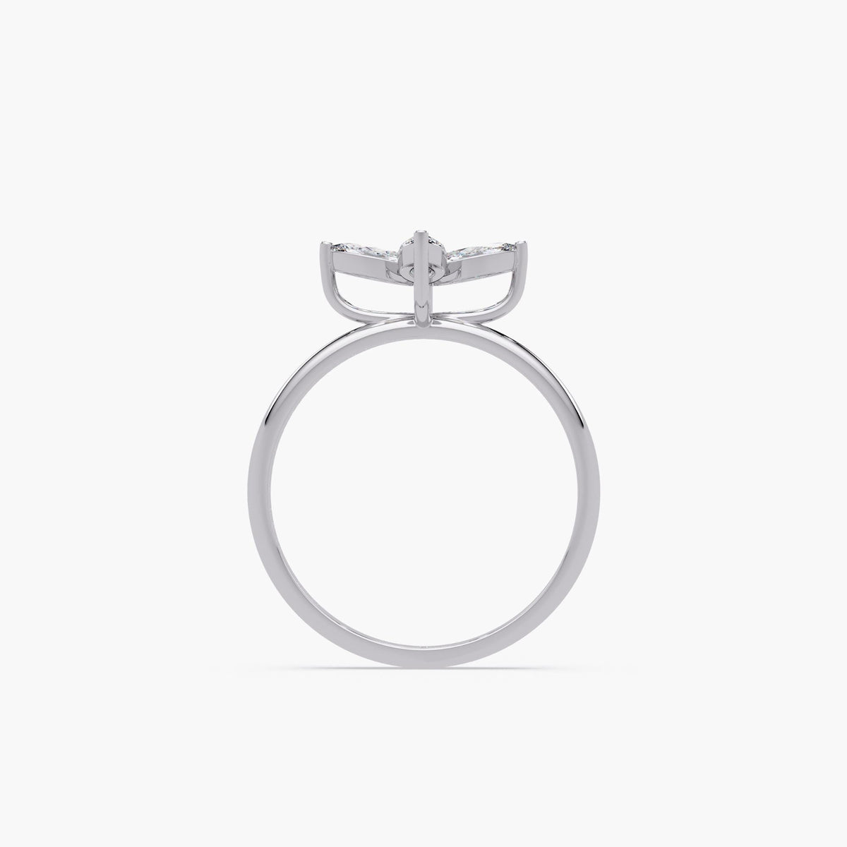 diamond clover ring in white gold showing raised setting and slim polished band