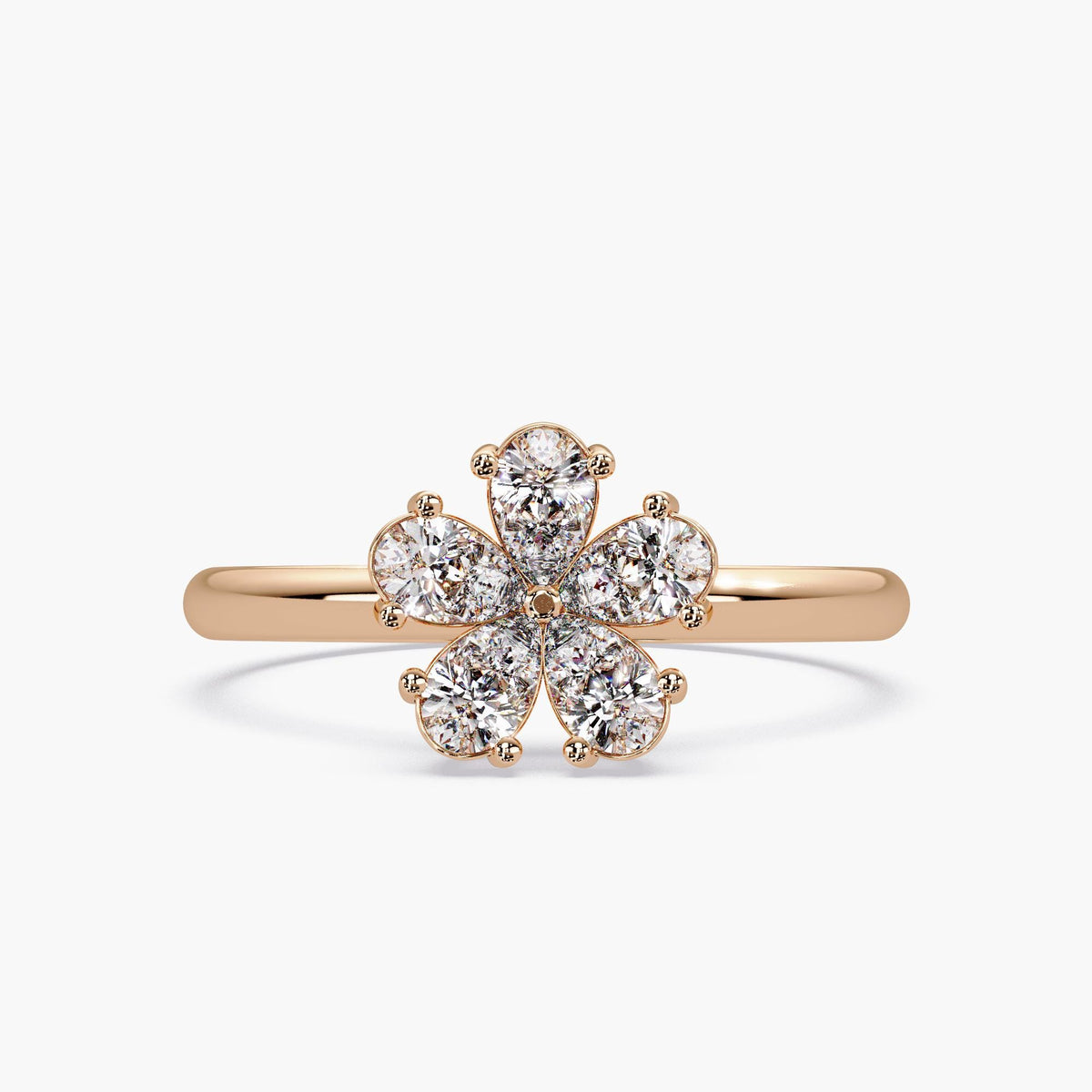 14K rose gold flower ring with pear shaped diamonds in petal cluster, nature-inspired gift jewelry design