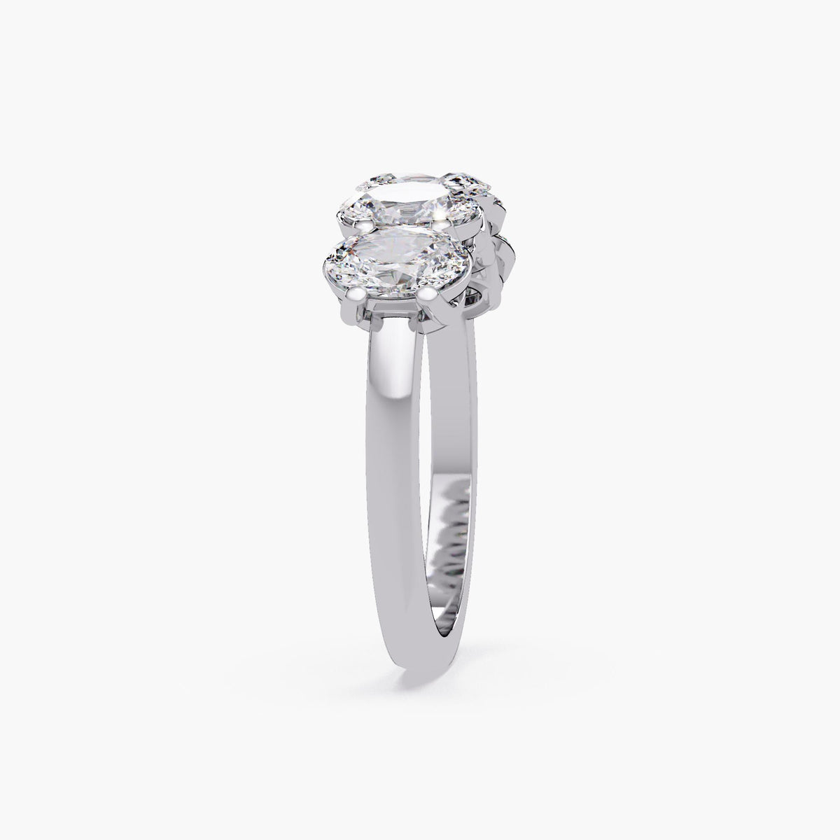five stone oval diamond half eternity ring in 14K white gold, showing prong setting and slim polished band.