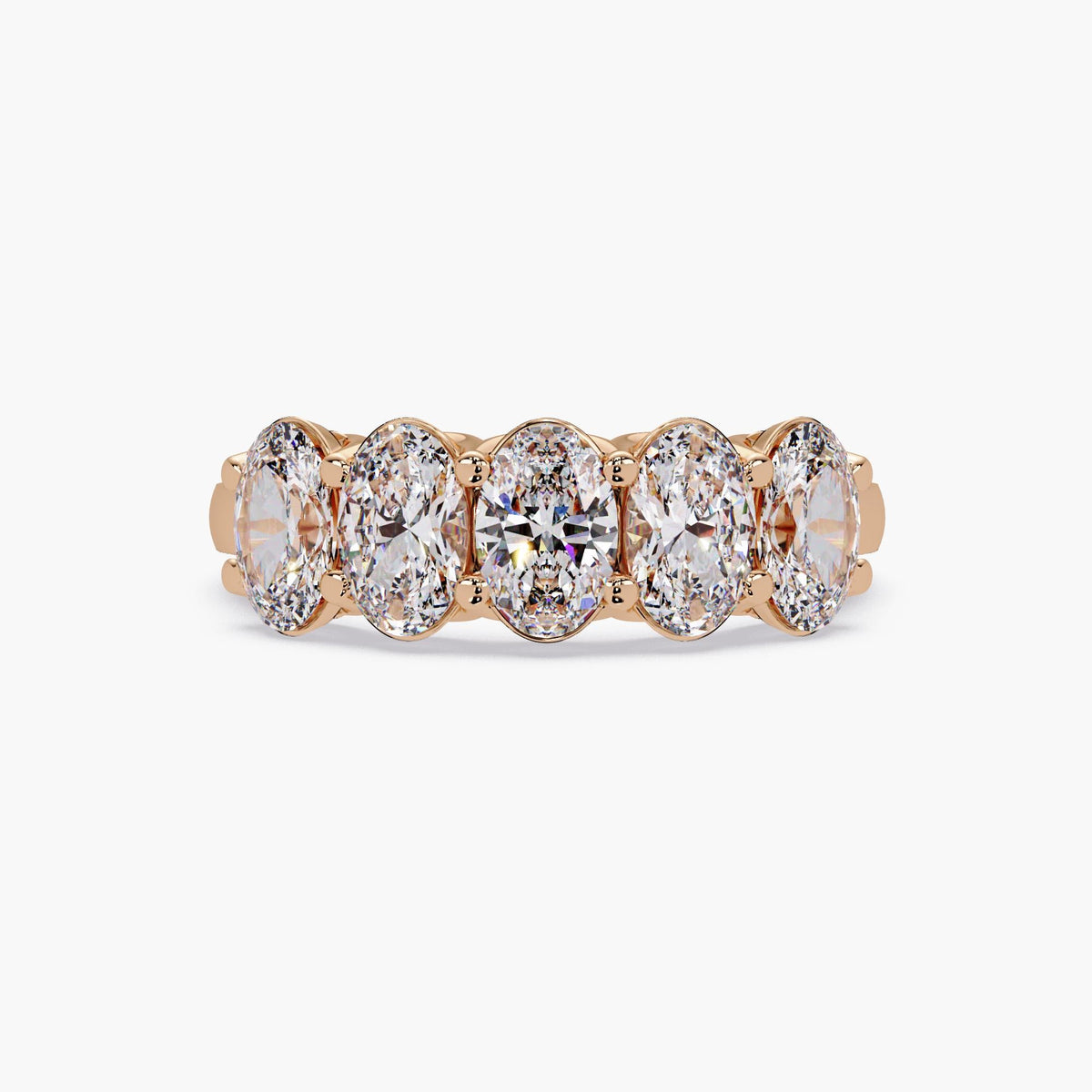 five stone oval diamond half eternity band in 14K rose gold, set with lab-grown diamonds for a romantic anniversary or wedding ring.