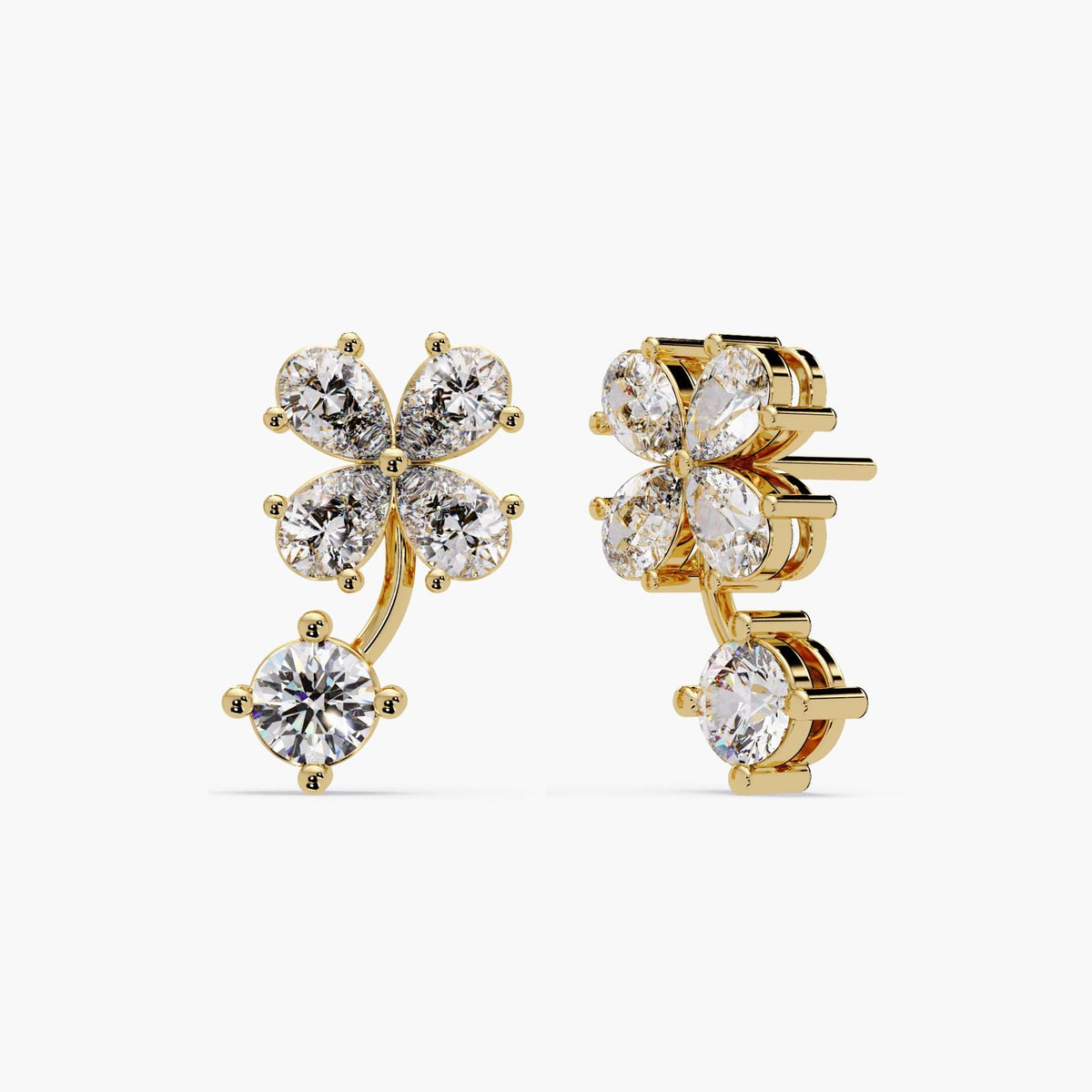 14K gold floral diamond earrings featuring four pear-cut lab-grown diamonds forming a sculptural clover with a round-cut diamond drop. Unique curved setting hugs the earlobe, offering a modern statement look. Ideal for bridal jewelry or everyday elegance.