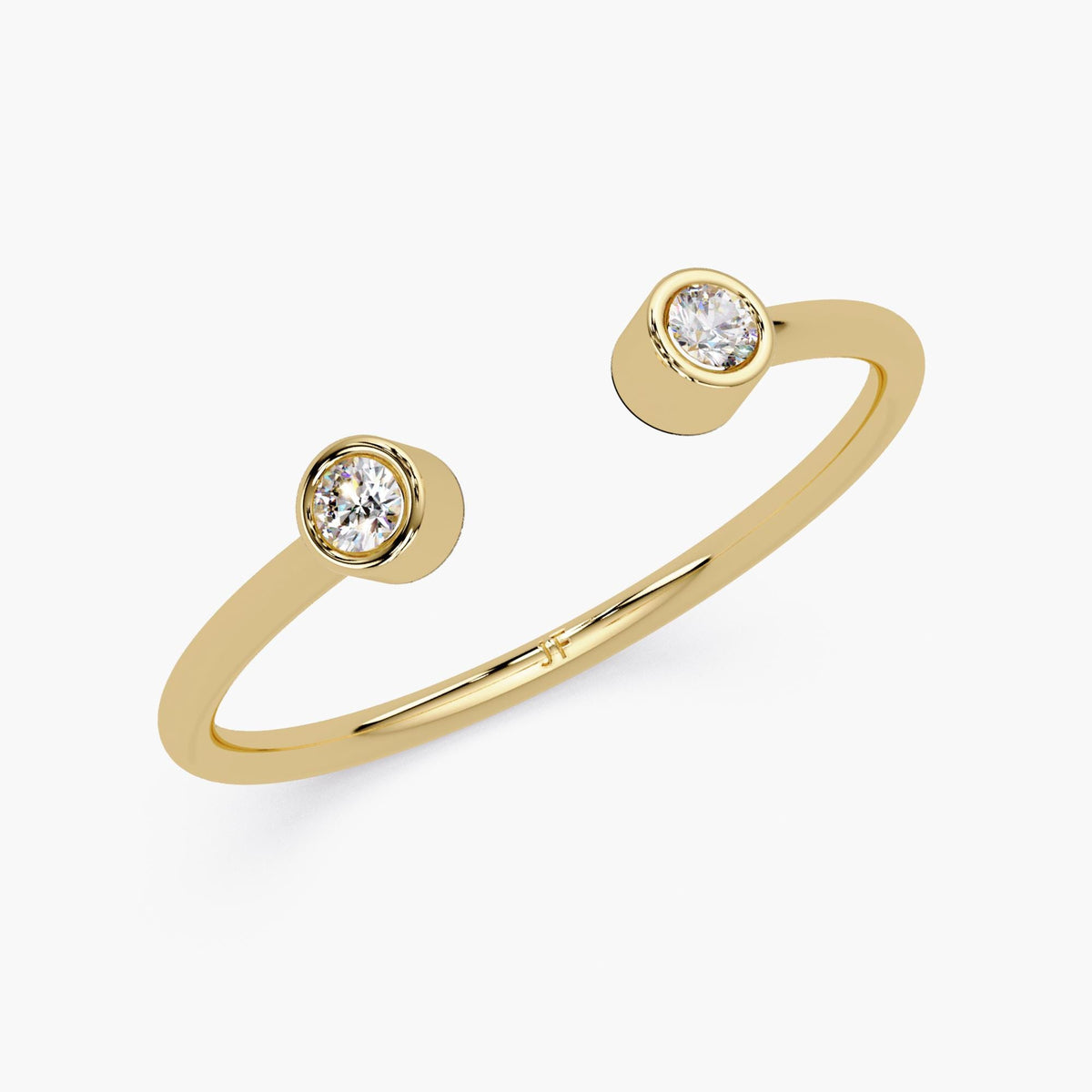 14k yellow gold open cuff ring with two bezel set natural diamonds.