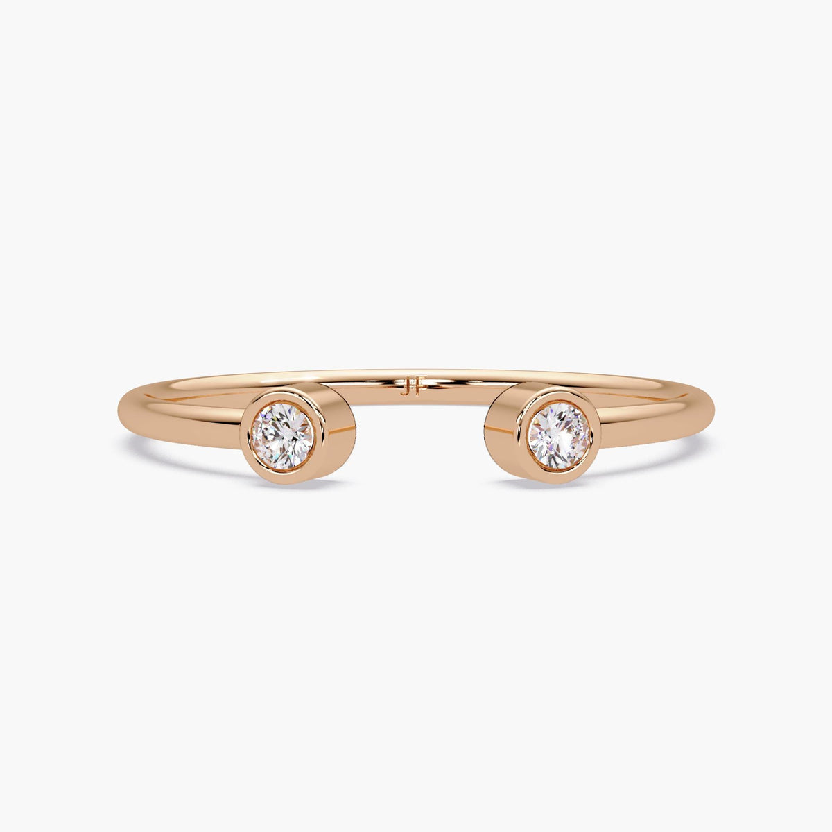 14k rose gold open cuff ring with two bezel set natural diamonds.