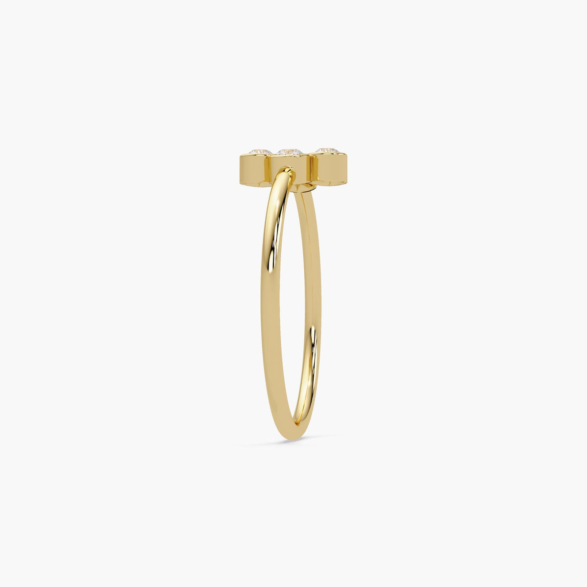 14k yellow gold four stone diamond ring with bezel set natural diamonds.