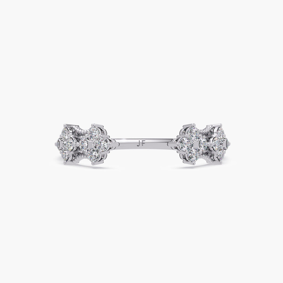 Dainty women’s wedding band with prong set diamonds.