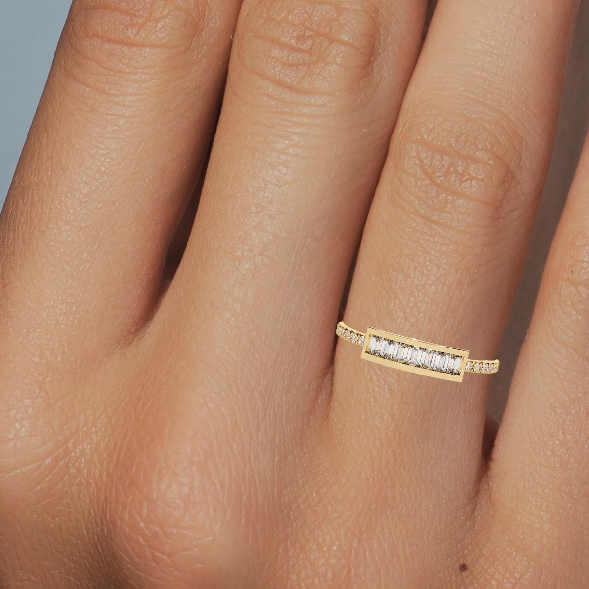 14K gold baguette bar ring with channel-set diamonds and pavé band