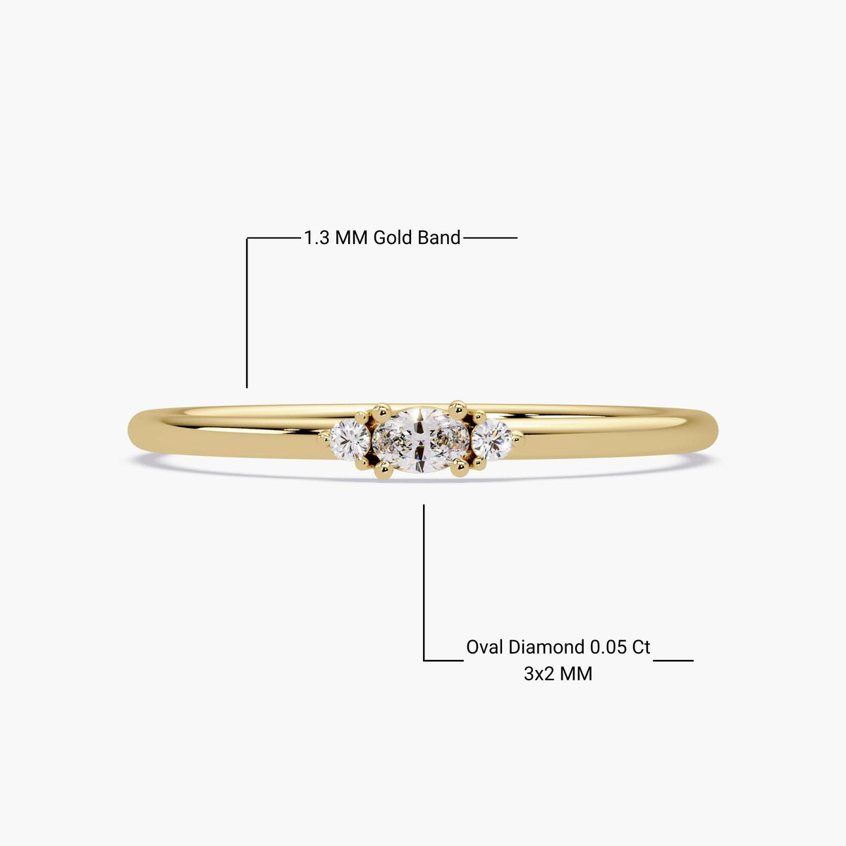14K yellow gold diamond ring showing a 1.3mm band width and a center oval lab-grown diamond (3x2mm, 0.05 ct) with round side stones.