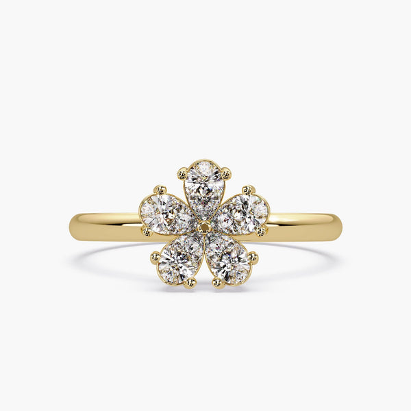 Diamond flower ring in 14K yellow gold with pear-shaped stones in petal cluster design, nature-inspired jewelry gift