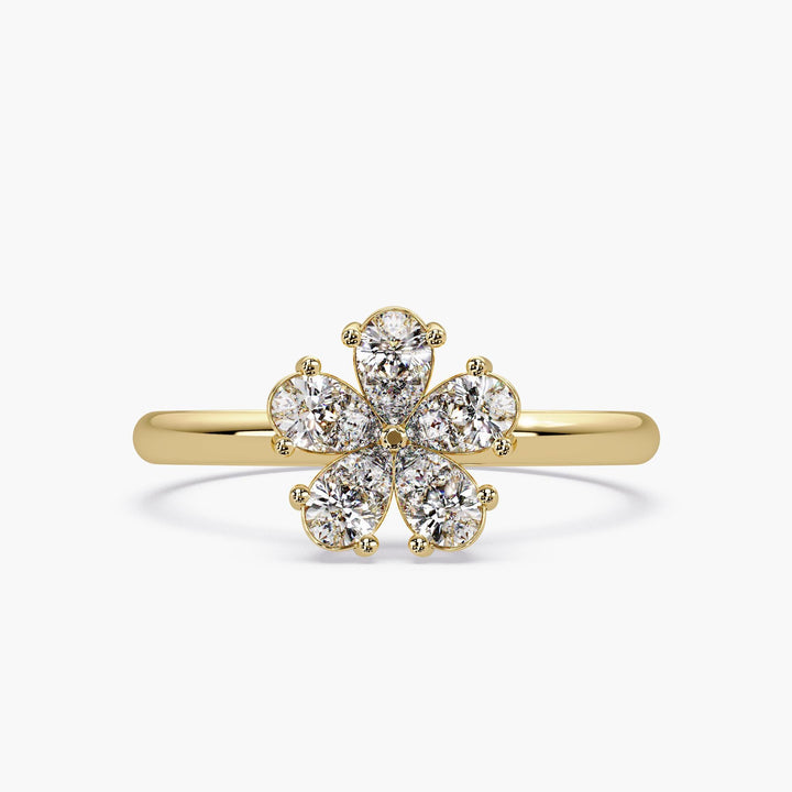 Diamond flower ring in 14K yellow gold with pear-shaped stones in petal cluster design, nature-inspired jewelry gift