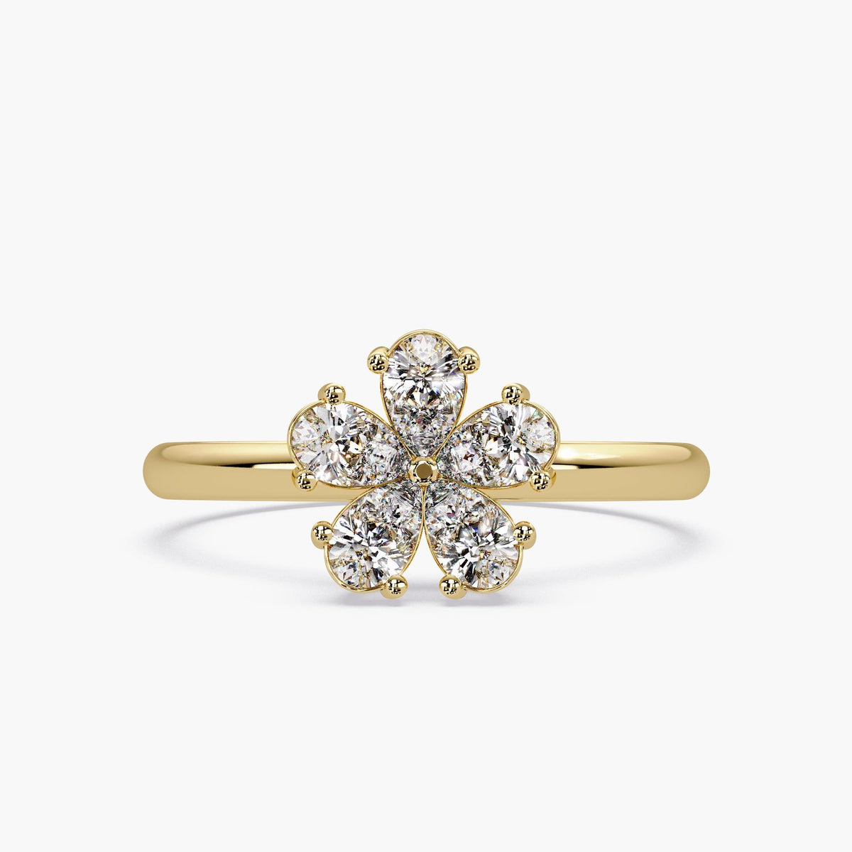 Diamond flower ring in 14K yellow gold with pear-shaped stones in petal cluster design, nature-inspired jewelry gift