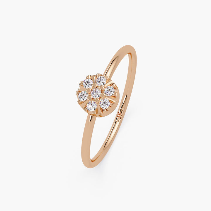 Handmade solid gold ring with a delicate flower diamond design.