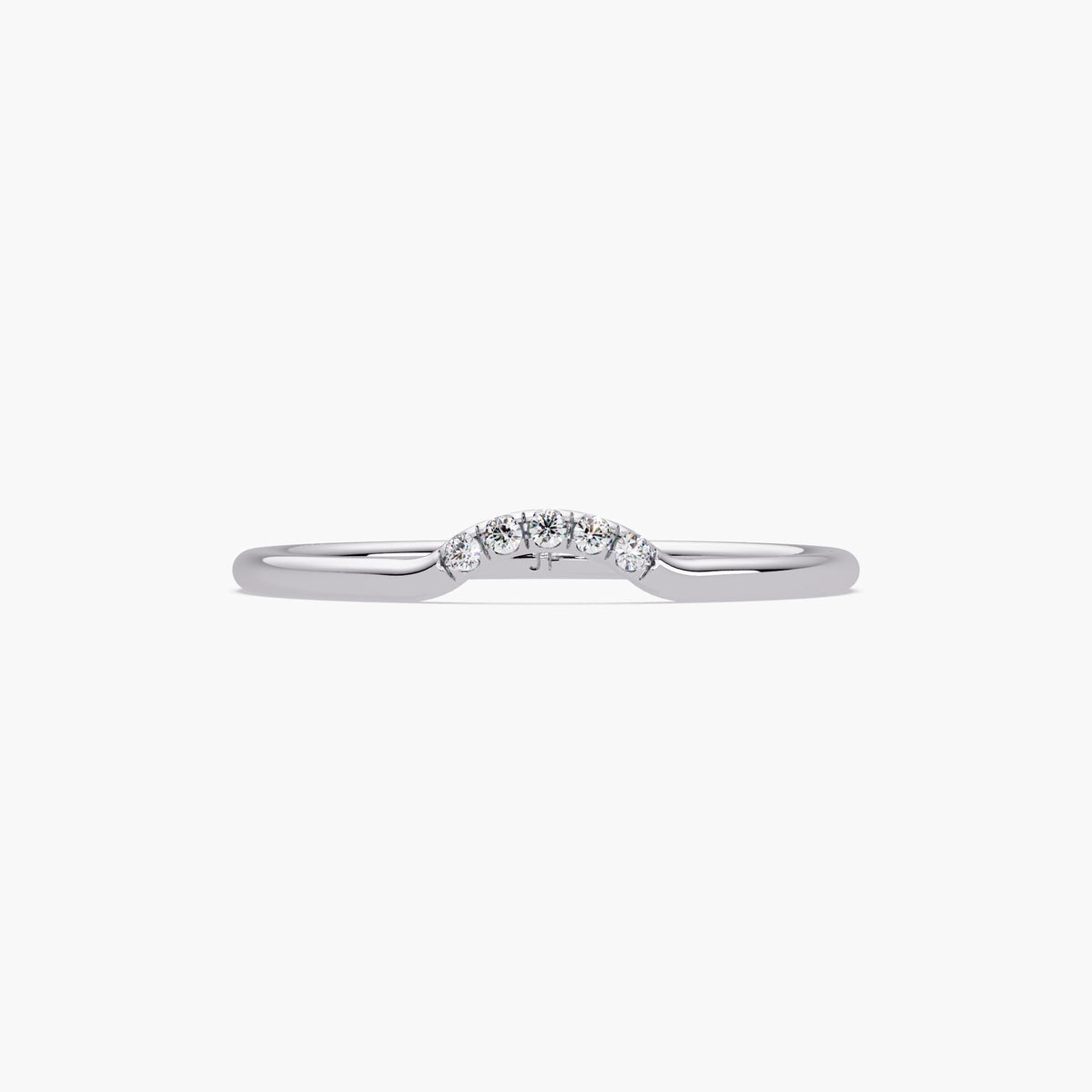 Dainty thin gold wedding band with small sparkling diamonds.