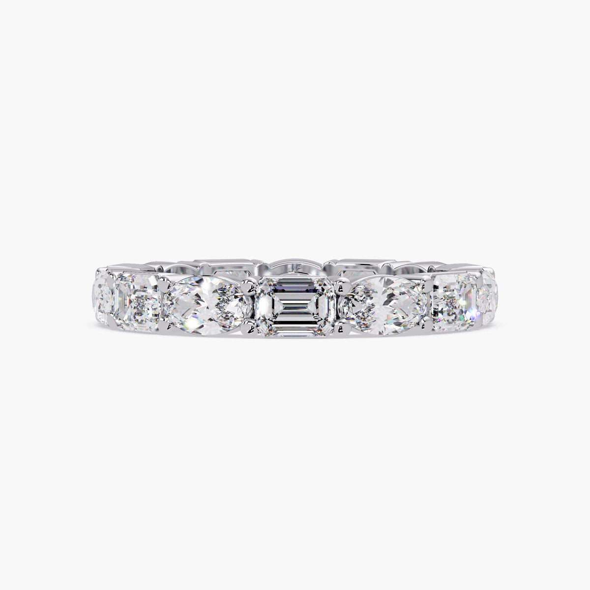 Oval emerald cut diamond anniversary ring in 14k gold.
