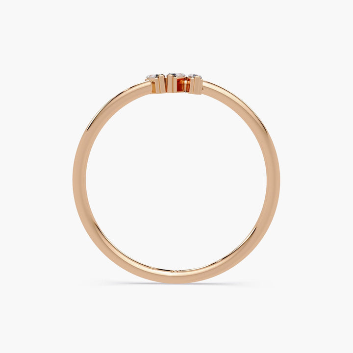 Elegant baguette diamond trio ring for stacking or solo wear.