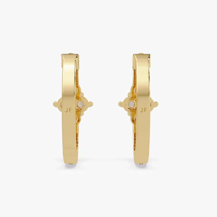 14K yellow gold hoop earrings on a white background, featuring a floral or clover-shaped cluster of lab-grown diamonds at the front.