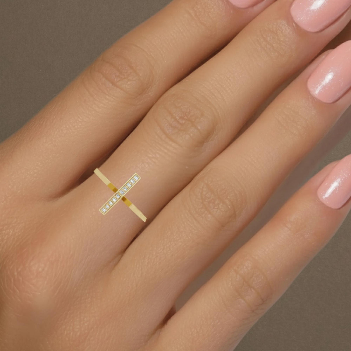 Modern stacking ring with diamonds in a slim gold band.