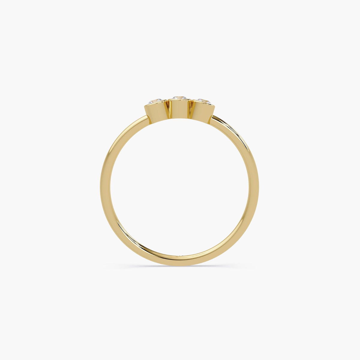 14k gold three stone diamond ring with bezel set natural diamonds.