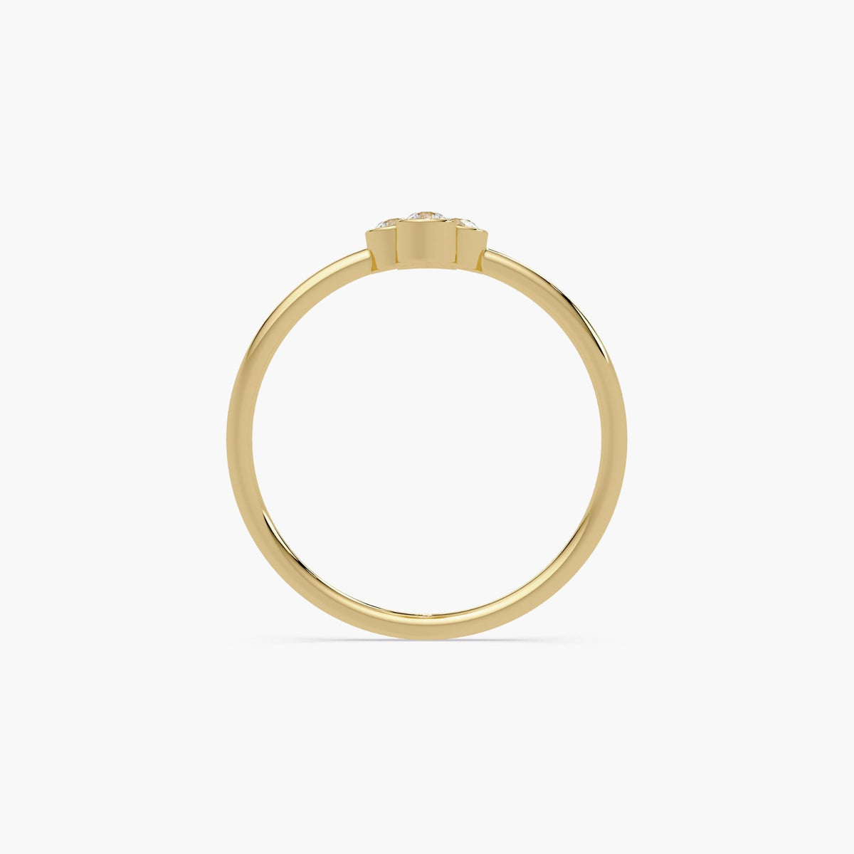 14k yellow gold four stone diamond ring with bezel set natural diamonds.