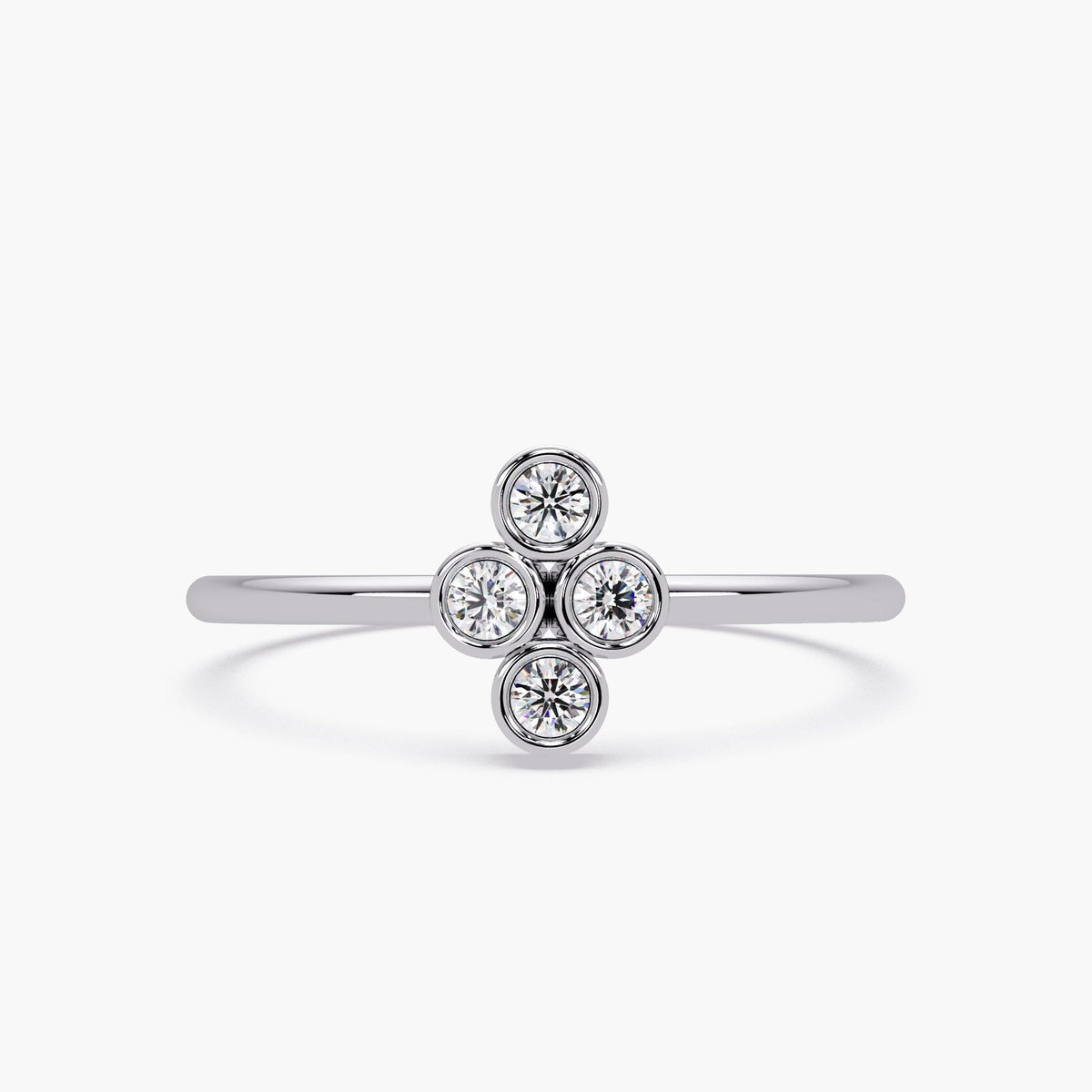 14k white gold four stone diamond ring with bezel set natural diamonds.