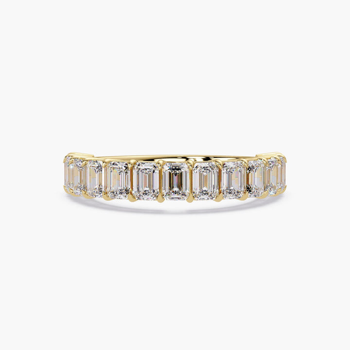 Emerald cut diamond band with slim design.